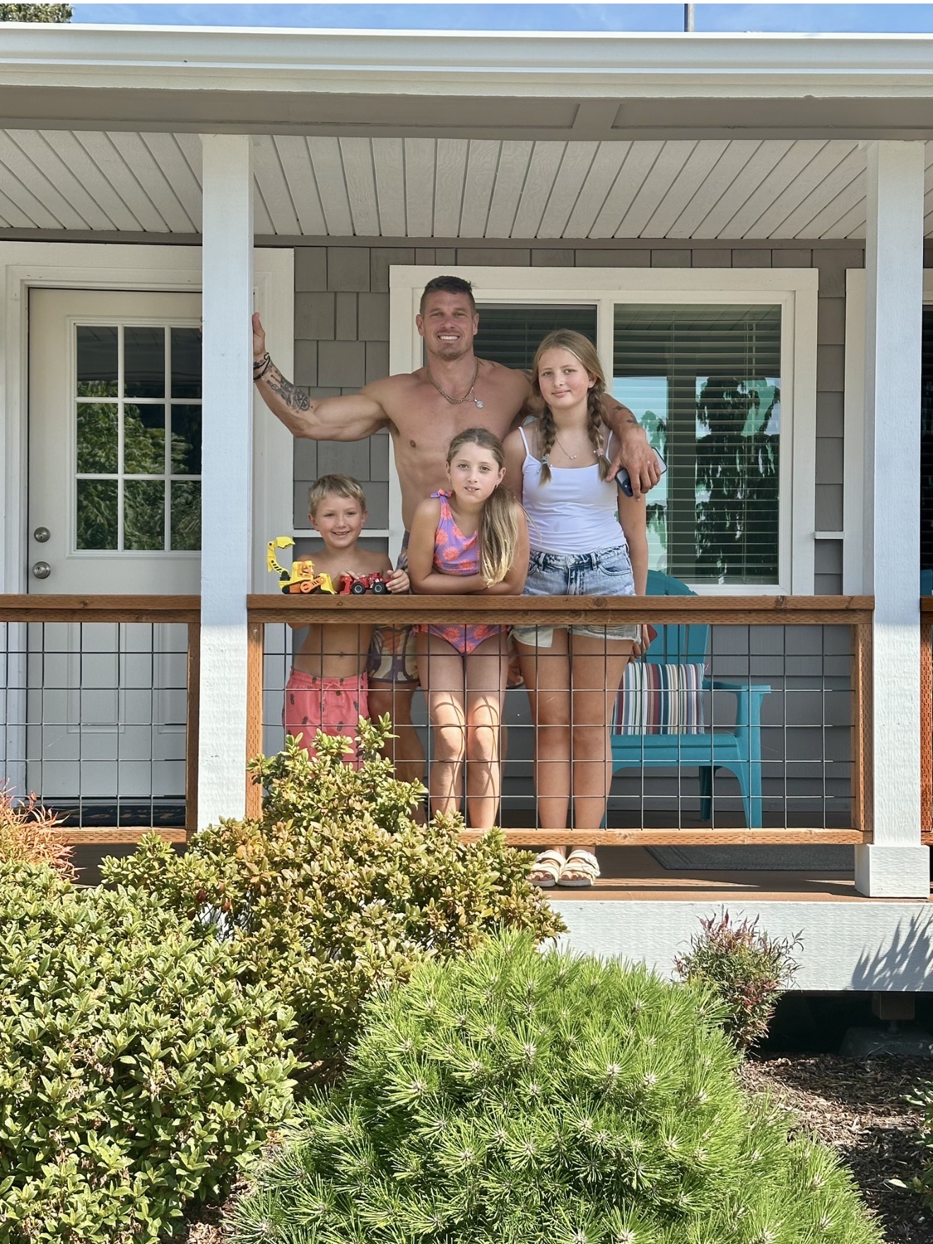 Curtis Selz with his children at their family home