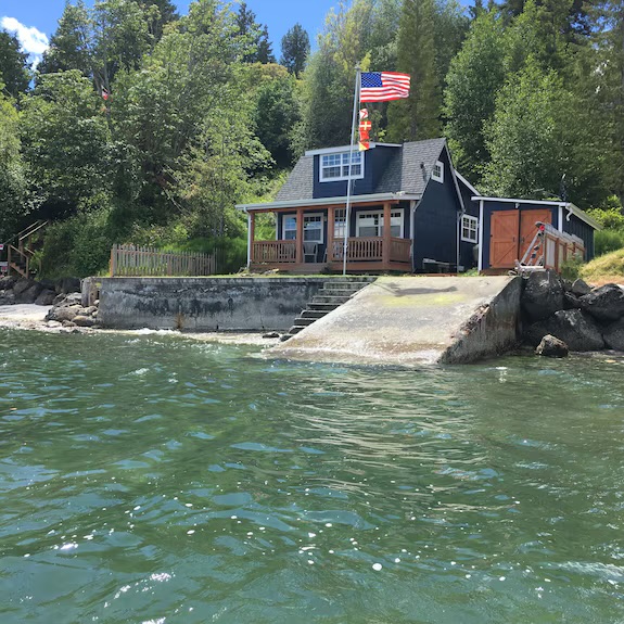 Small waterfront vacation home with a private boat launch